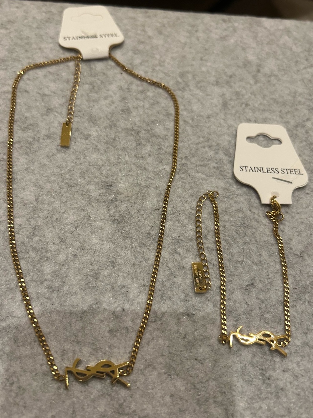 MUST HAVE ..Gold Tone Lettered Necklace and Bracelet Set
